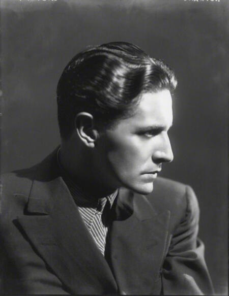 a black and white image of ivor novello looking to the side